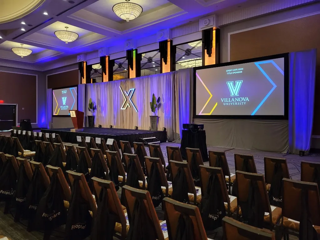 Title sponsor presentation and stage lighting on the main keynote stage